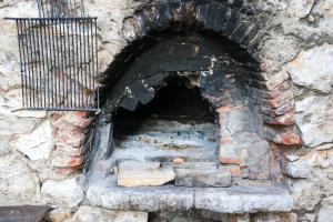 a brick oven in a stone wall at Holiday house with a parking space Bobovisca, Brac - 11435 in Ložišće
