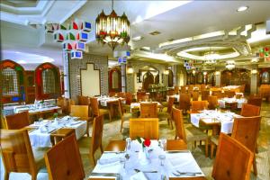 Reštaurácia alebo iné gastronomické zariadenie v ubytovaní Toledo Amman Hotel