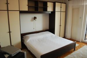 Posteľ alebo postele v izbe v ubytovaní Quadruple Room Pag 11487b