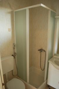 Kúpeľňa v ubytovaní Quadruple Room Pag 11487b