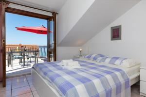 Fotografia z galérie ubytovania Apartments by the sea Sumpetar, Omis - 11462 v destinácii Jesenice