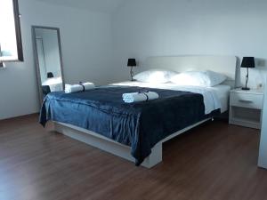 Posteľ alebo postele v izbe v ubytovaní Apartments by the sea Sladjenovici, Dubrovnik - 11531