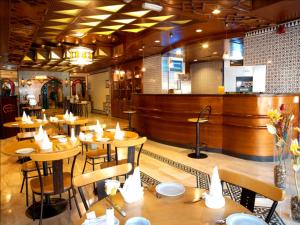 Reštaurácia alebo iné gastronomické zariadenie v ubytovaní Toledo Amman Hotel