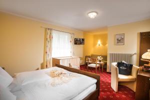 Posteľ alebo postele v izbe v ubytovaní Landhotel Steindlwirt