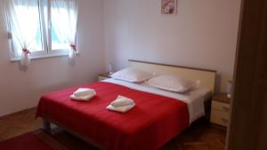 Lova arba lovos apgyvendinimo įstaigoje Apartments by the sea Vinisce, Trogir - 13775