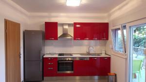 Virtuvė arba virtuvėlė apgyvendinimo įstaigoje Apartments by the sea Vinisce, Trogir - 13775