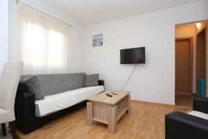 Televízia a/alebo spoločenská miestnosť v ubytovaní Apartment Split 11518c