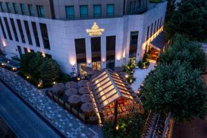 an overhead view of a hotel at night at The Sukhothai Shanghai in Shanghai