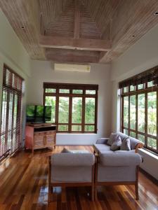 Televisyen dan/atau pusat hiburan di Casada Suitte Pool Villa