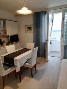 Kuchyňa alebo kuchynka v ubytovaní Apartment Domines