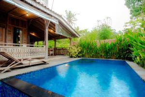 Bazén v ubytování Nauna Villa Ubud nebo v jeho okolí