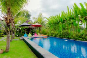 Bazén v ubytování Nauna Villa Ubud nebo v jeho okolí