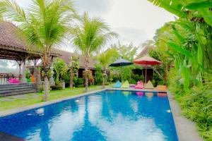 Bazén v ubytování Nauna Villa Ubud nebo v jeho okolí