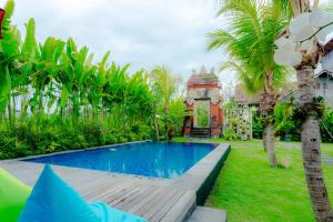 Bazén v ubytování Nauna Villa Ubud nebo v jeho okolí