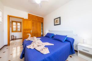 Łóżko lub łóżka w pokoju w obiekcie Apartamento Socorro 39-1