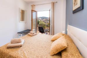 Łóżko lub łóżka w pokoju w obiekcie Apartamento Socorro 39-1