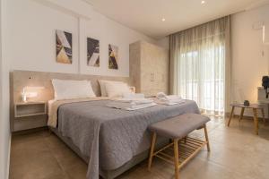 Ένα ή περισσότερα κρεβάτια σε δωμάτιο στο Evriali Comfort Living