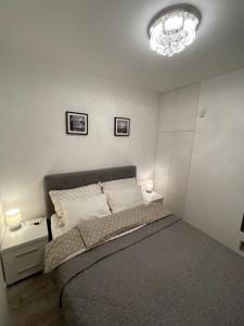 Posteľ alebo postele v izbe v ubytovaní Baltica Heaven Apartmant 95F
