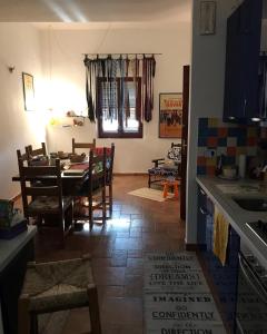A kitchen or kitchenette at Casa Tognetti Affittacamere