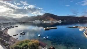 a view of a body of water with boats in it at Kalliopis Rooms in Katapola +62 photos