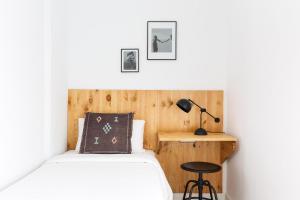 Posteľ alebo postele v izbe v ubytovaní WOW Apartments by Olala Homes