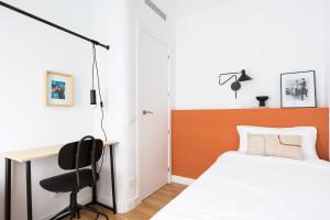 Posteľ alebo postele v izbe v ubytovaní WOW Apartments by Olala Homes