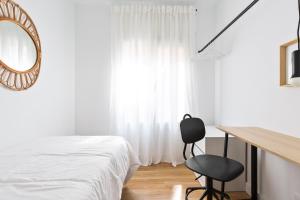 Posteľ alebo postele v izbe v ubytovaní WOW Apartments by Olala Homes