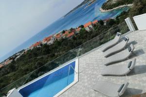 Fotografie z fotogalerie ubytování Apartments with a swimming pool Kanica, Rogoznica - 11249 v Rogoznici + 24 fotografií