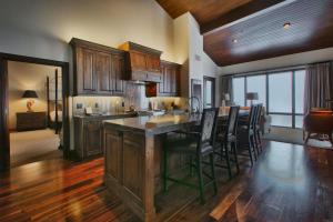 a kitchen with a large island in the middle of a room at Premium Luxury Three Bedroom Suite with Two Hot Tubs apartment hotel in Park City