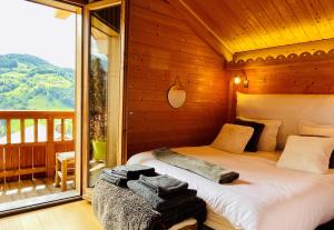 Postel nebo postele na pokoji v ubytování Le Paret chambres d'hôtes de charme & spa
