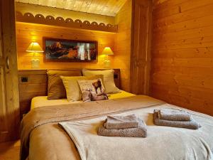 Postel nebo postele na pokoji v ubytování Le Paret chambres d'hôtes de charme & spa