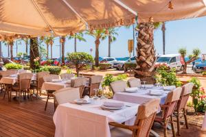 Een restaurant of ander eetgelegenheid bij Hotel Marsol