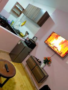Kuchyň nebo kuchyňský kout v ubytování Joy fully furnished apartment