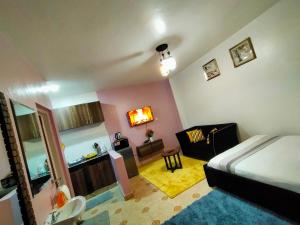 Kuchyň nebo kuchyňský kout v ubytování Joy fully furnished apartment
