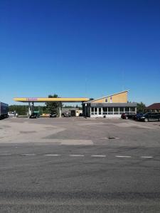 a large gas station with a large parking lot at Trevena Endriejavas 