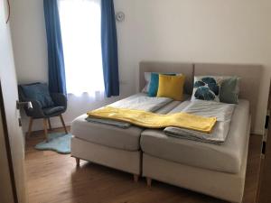 Łóżko lub łóżka w pokoju w obiekcie Residence JORADO
