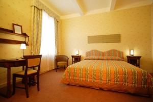 Postel nebo postele na pokoji v ubytování Hotel Locanda Di Bagnara