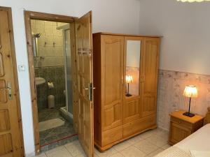 a bathroom with a shower and a glass door at Apartments Panorama Ravda in Ravda +128 photos