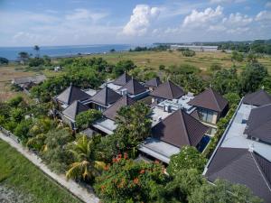 an aerial view of a group of houses at Room in Villa - Kori Maharani Villas - One Bedroom Villa with Private Pool 4 in Siyut