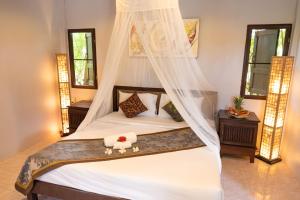 Postel nebo postele na pokoji v ubytování Satva Samui Yoga and Wellness Resort + 36 fotografií