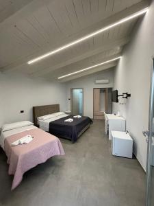 Postel nebo postele na pokoji v ubytování B&B Resort El Bisagrà