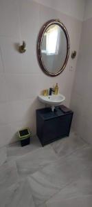 A bathroom at Misel Apartman house Siófok
