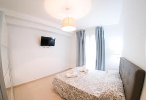 Posteľ alebo postele v izbe v ubytovaní Residence Chanel