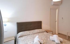 Posteľ alebo postele v izbe v ubytovaní Residence Chanel