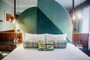 Voodi või voodid majutusasutuse Arthaus Hotel toas