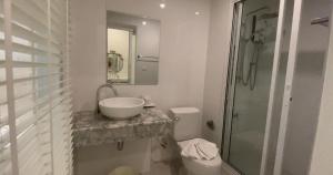 حمام في Shunli Hotel - SHA Extra Plus