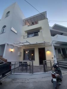 a motorcycle parked in front of a building at Cosy in Kardamaina