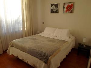 Voodi või voodid majutusasutuse Departamentos Amoblados La Hermandad toas