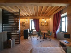 Łóżko lub łóżka w pokoju w obiekcie Relais Colle Messino Briaglia Mondovì