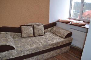Кровать или кровати в номере Zarvanskaya Street 5